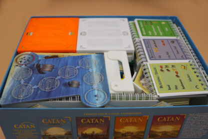 Organizer for Catan, Cities & Knights, and both 6 player extensions to fit everything into one box.